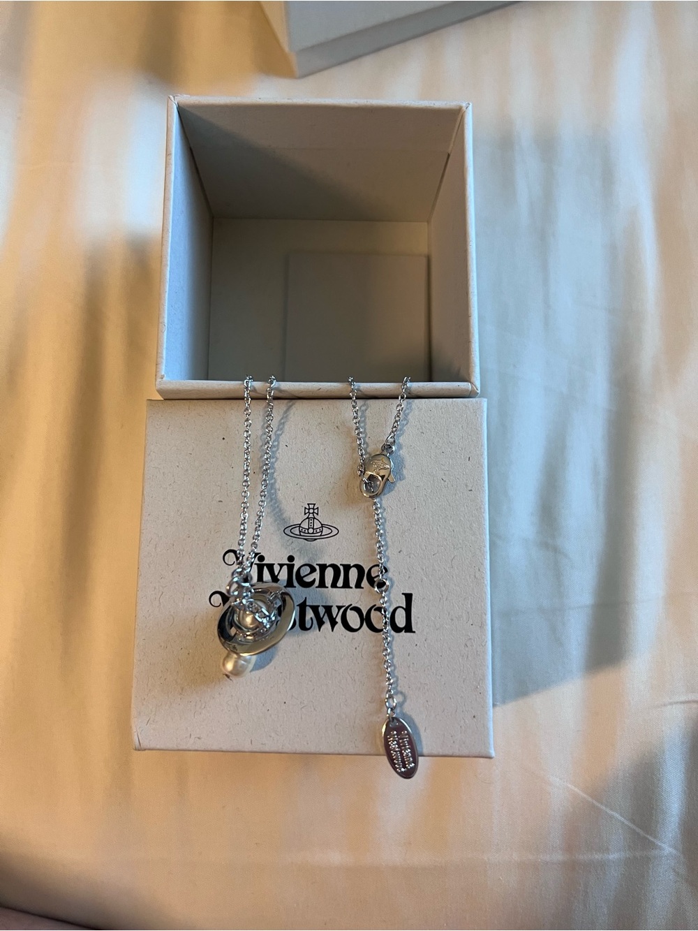 Vivienne Westwood Claude Emiliana Silver and White Pearl Charm Necklace - Picture 2 of 9